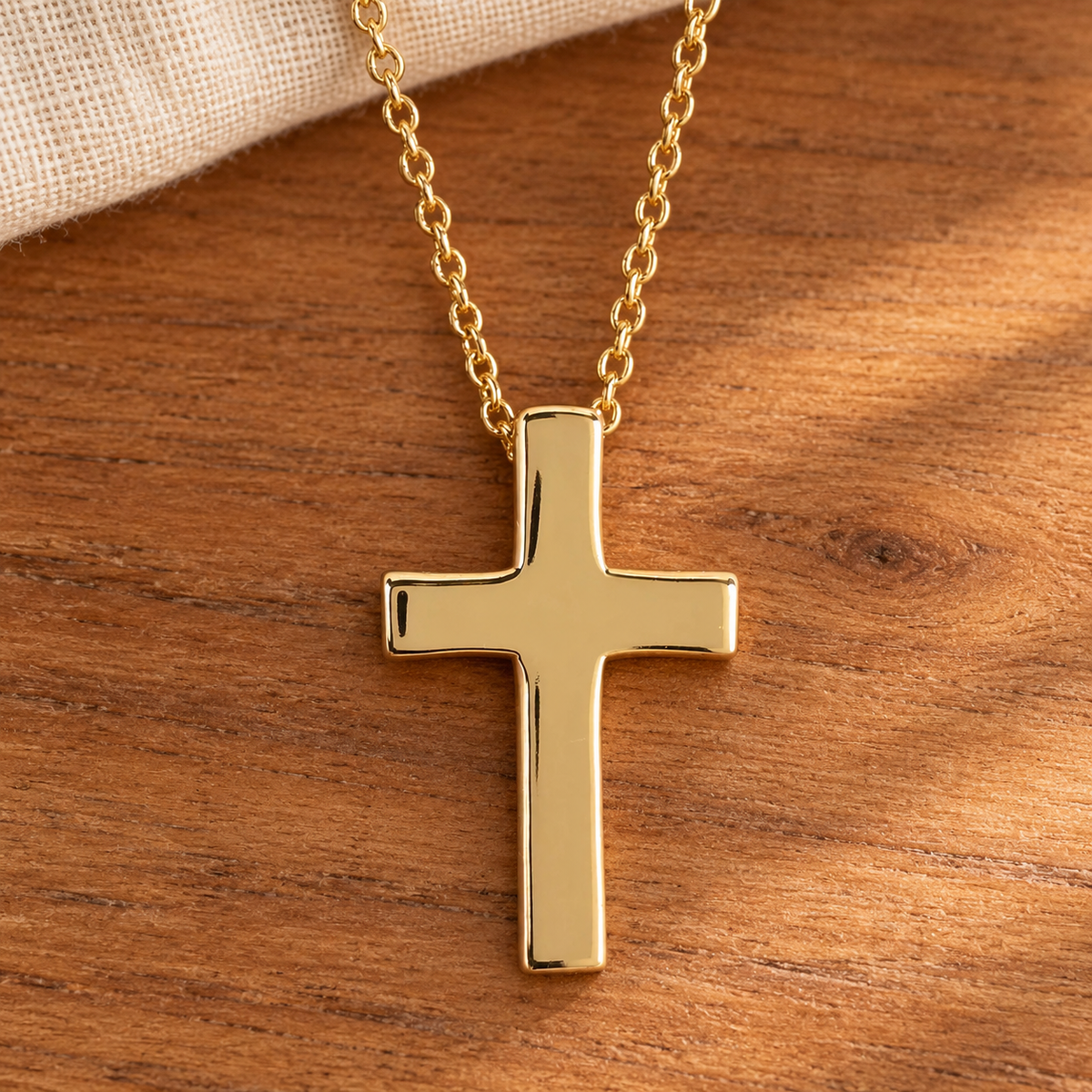 Gold graduated box cross necklace